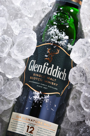 POZNAN, POL - JUN 18, 2020: Bottle of Glenfiddich, the world's best-selling single-malt whiskey, owned and produced by William Grant and Sons in Dufftown, Scotlandのeditorial素材