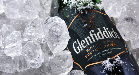 POZNAN, POL - JUN 18, 2020: Bottle of Glenfiddich, the world's best-selling single-malt whiskey, owned and produced by William Grant and Sons in Dufftown, Scotlandのeditorial素材
