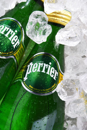 POZNAN, POL - JUN 18, 2020: Bottles of Perrier, a French brand of natural bottled mineral water sold worldwide and available in 140 countries.のeditorial素材