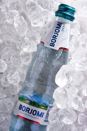 POZNAN, POL - JUL 02, 2020: Bottle of Borjomi, a brand of naturally carbonated mineral water from springs in the Borjomi Gorge of central Georgiaのeditorial素材