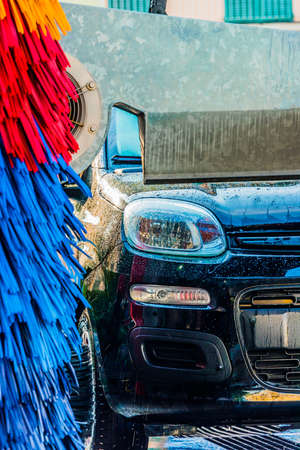 Car going through an automated car wash machine.の写真素材