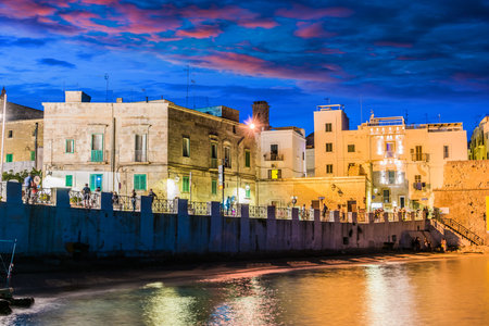 MONOPOLI, ITALY - SEP 2, 2020: View of Monopoli from the city beach of Cala Porta Vecchia, Apulia, Italy, located on the Adriatic Seaのeditorial素材