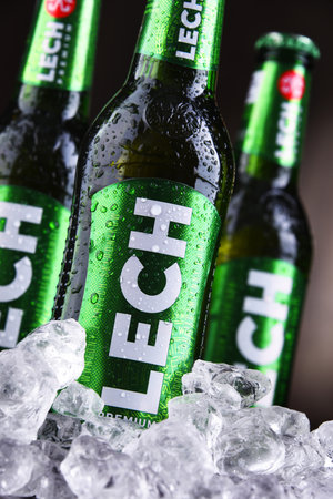 POZNAN, POL - OCT 2, 2020: Bottles of Lech, a brand of Polish beer produced by Kompania Piwowarska, a subsidiary of Asahi Breweriesのeditorial素材