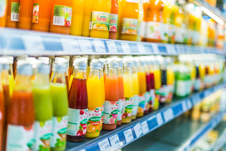POZNAN, POL - APR 13, 2021: Variety of cold drink products put up for sale in a commercial refrigeratorのeditorial素材