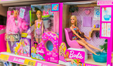 POZNAN, POL - APR 28, 2021: Barbie dolls put up for sale on a store shelfのeditorial素材