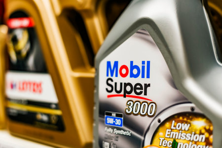 POZNAN, POL - APR 28, 2021: Mobile Super engine oil put up for sale in the store