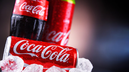 POZNAN, POL - MAY 13, 2021: Bottle and cans of Coca-Cola, a carbonated soft drink manufactured by The Coca-Cola Company headquartered in Atlanta, Georgia, USAのeditorial素材