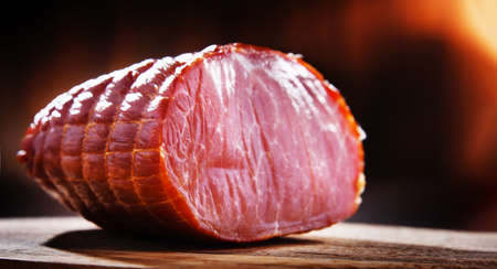 Piece of smoked ham. Meatworks productの写真素材