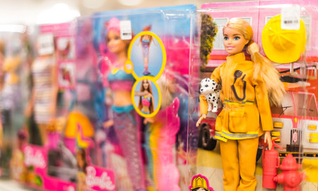 POZNAN, POL - JUN 17, 2021: Barbie dolls put up for sale on a store shelfのeditorial素材