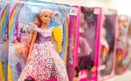 POZNAN, POL - JUN 17, 2021: Barbie dolls put up for sale on a store shelfのeditorial素材