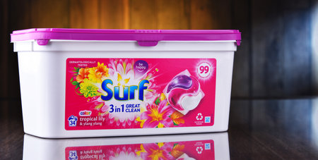 POZNAN, POL - JUN 10, 2021: A box of Surf capsule laundry detergent product, manufactured and marketed by Unileverのeditorial素材