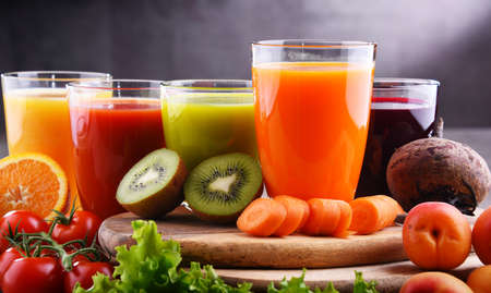 Glasses with fresh organic vegetable and fruit juices. Detox dietの写真素材