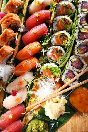 Composition with a variety of sushi rollsの写真素材