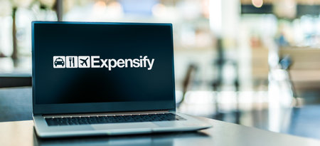 POZNAN, POL - MAY 1, 2021: Laptop computer displaying logo of Expensify, a software company that develops an expense management system for personal and business useのeditorial素材