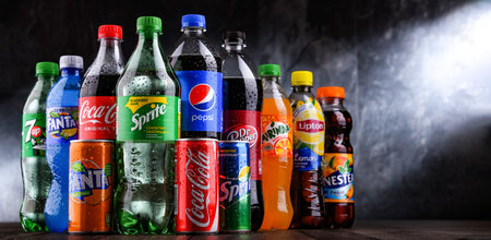 POZNAN, POLAND - OCT 28, 2021: Bottles of global soft drink brands including products of Coca Cola Company and Pepsicoのeditorial素材