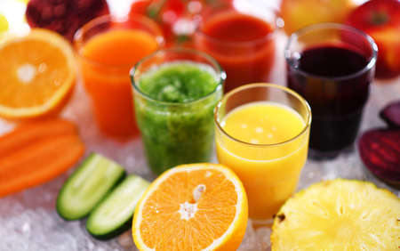 Glasses with fresh organic vegetable and fruit juices. Detox dietの写真素材