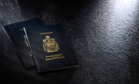 Composition with two Canadian passports. Personal identificationのeditorial素材