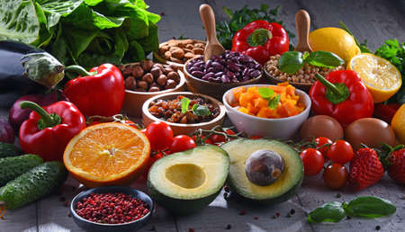Composition with assorted organic food products on wooden kitchen tableの写真素材