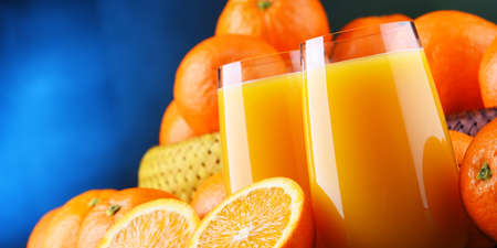 Glasses with freshly squeezed orange juice.の写真素材
