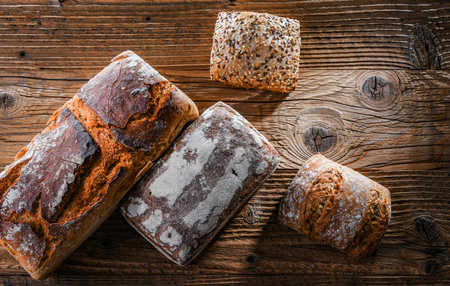 Composition with assorted bakery products on wooden table.