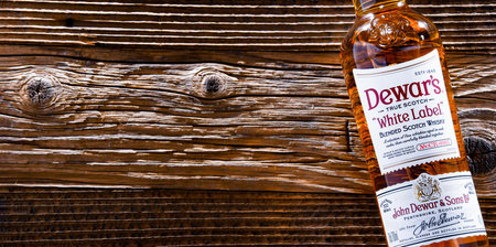 POZNAN, POL - APR 13, 2022: Bottle of Dewars, a brand of whiskey owned by Bacardi, the worldのeditorial素材