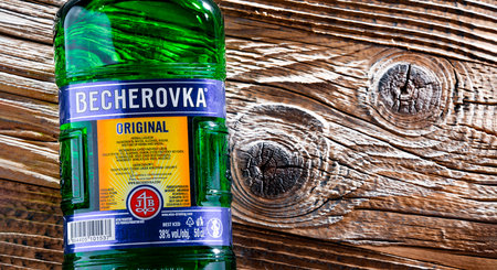 POZNAN, POL - APR 13, 2022: Bottle of Becherovka, a herbal bitters produced in Karlovy Vary, Czech Rep. by the Jan Becher company. Owned by Pernod Ricard.のeditorial素材