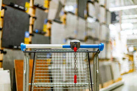 A shopping cart in a home improvement store.