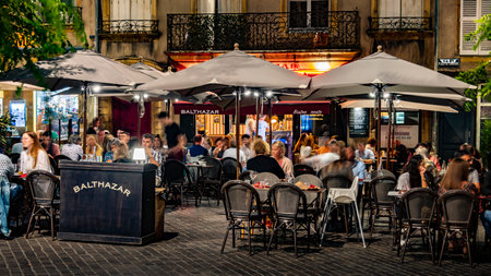 METZ, FRANCE - AUG 5, 2022: Restaurants in the Old Town of Metz in the nightのeditorial素材