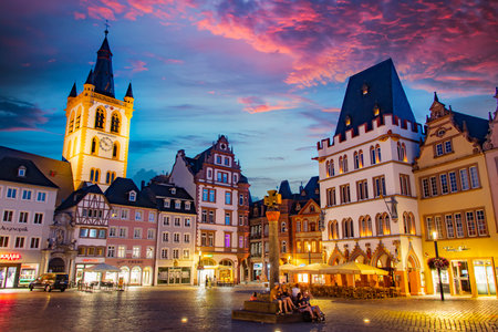 TRIER, GERMANY - AUG 4, 2022: Monumental architecture of Trier main market with St. Gangolf's...