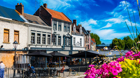 REIMS, FRANCE - AUG 6, 2022: Restaurants at the Somme river in the old town of Amiens, Franceのeditorial素材
