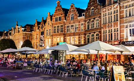 LEUVEN, BELGIUM - AUG 25, 2022: Restaurants in the old town of Leuven, in the Flemish Region of Belgium, in the nightのeditorial素材