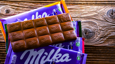POZNAN, POL - AUG 17, 2022: Milka chocolates, a brand of chocolate confection which originated in Switzerland in 1825 and since 1990 has been manufactured by the Mondelez Int. (Formerly Kraft Foods)のeditorial素材