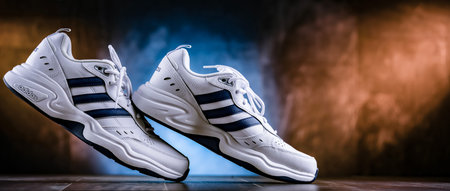 POZNAN, POL - OCT 13, 2022: A pair of Adidas sport shoes, the brand of the largest sportswear...