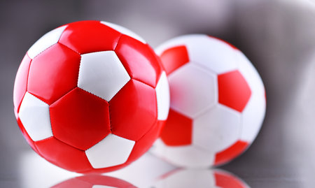 Composition with two leather soccer ballsの写真素材