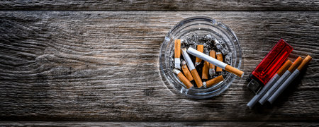 Composition with an ashtray and cigarettes.の写真素材