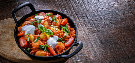 Creamy tomato gnocchi with burrata, basil and garlic.