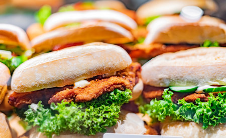 Freshly prepared sandwiches sold in a fast food restaurant.の写真素材