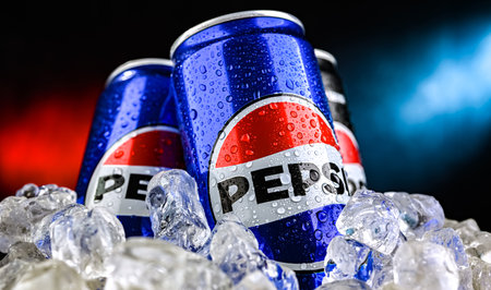 POZNAN, POL - AUG 7, 2024: Cans of Pepsi, a carbonated soft drink produced and manufactured by PepsiCo. The beverage was created and developed in 1893 under the name Brad's Drinkのeditorial素材