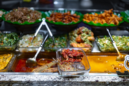 Traditional Asian dishes sold in a shopping mall food court in Singapore.の写真素材