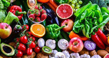 Variety of raw vegetables and fruits. Vegetarian diet.の写真素材