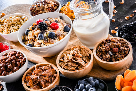 Composition with different sorts of breakfast cereal products and fresh fruitsの写真素材