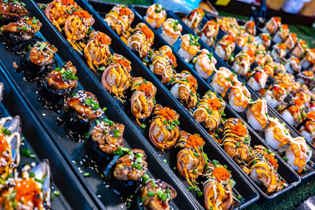 Street food sold at Ao Nang Landmark Night Market, Thailand.の写真素材