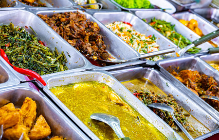 Street food sold at Jalan Alor market in Bukit Bintang district in Kuala Lumpur, Malaysiaの写真素材