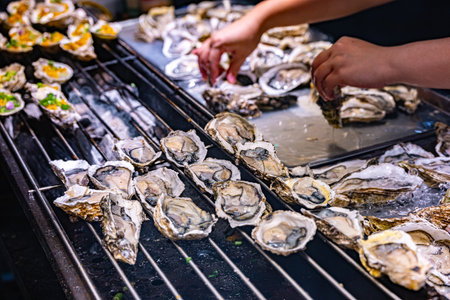 Street food sold at Jalan Alor market in Bukit Bintang district in Kuala Lumpur, Malaysiaの写真素材