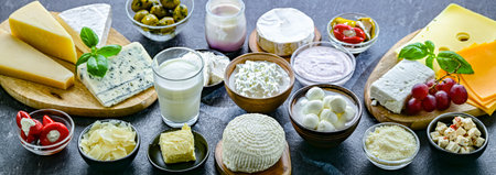 A variety of dairy products including cheese, milk and yogurt.