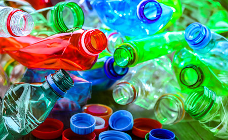 Empty colored drink bottles. Recyclable plastic waste.
