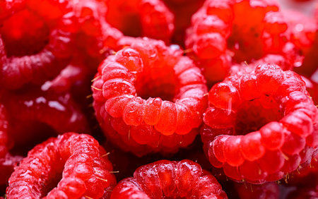 Composition with fresh ripe raspberries.