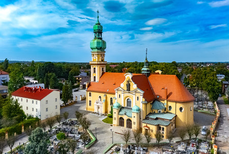 TYCHY, POLAND - AUG 28, 2025: Mary Magdalene Church in Tychy old town, Upper Silesia, Poland.の写真素材