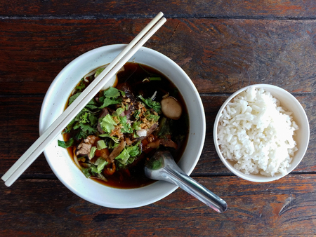 Pork and pork ball with soup and rice Thai food style