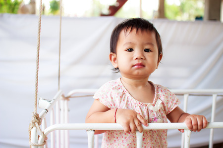 Children playing in the cradleの写真素材